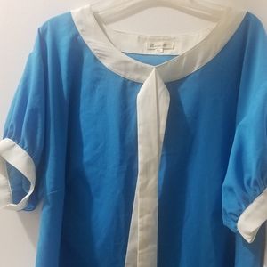 Blue shirt with white tie collar